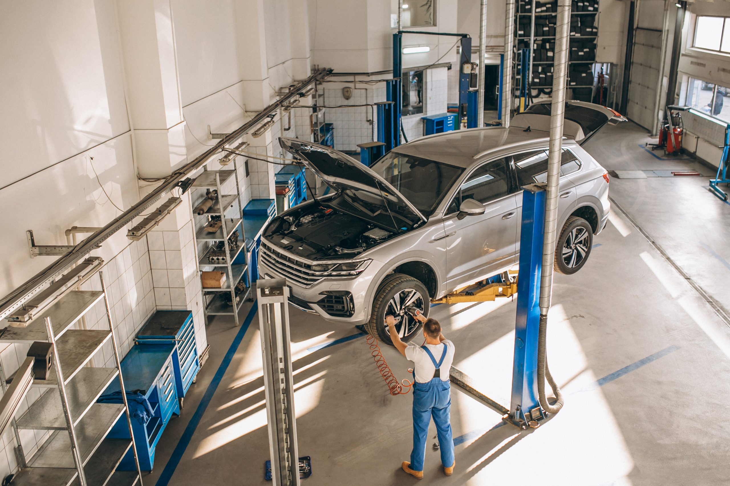 Car diagnostic and repair in an automotive service center.