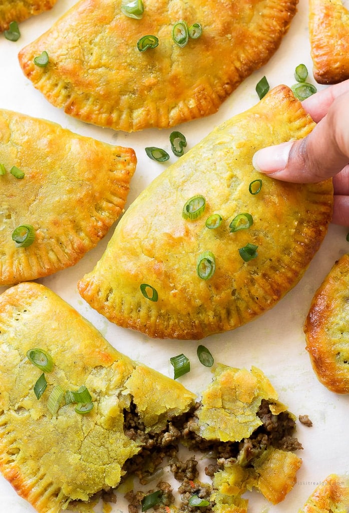 Homemade Jamaican beef patties on a baking sheet