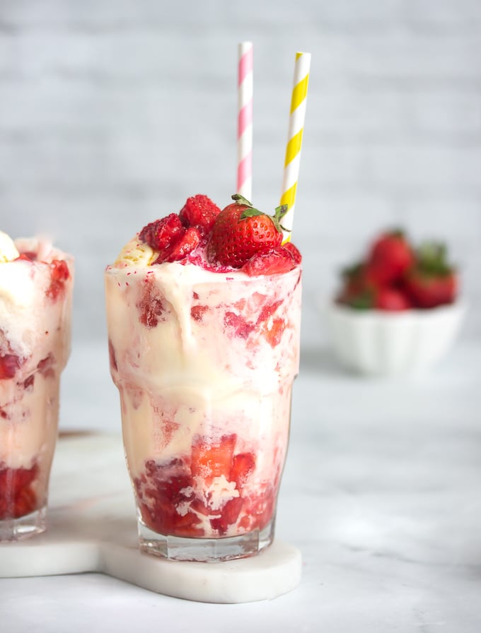 A strawberry float with macerated chopped strawberries, lime soda and vanilla ice cream topped with a strawberry