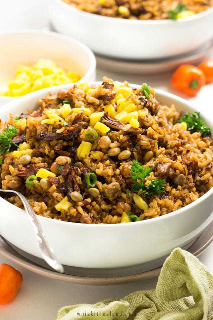 Trinidad Oxtail Pelau is a simple delicious spicy savory Caribbean dish with caramelized dark-brown meat or chicken served over a bed of rice.