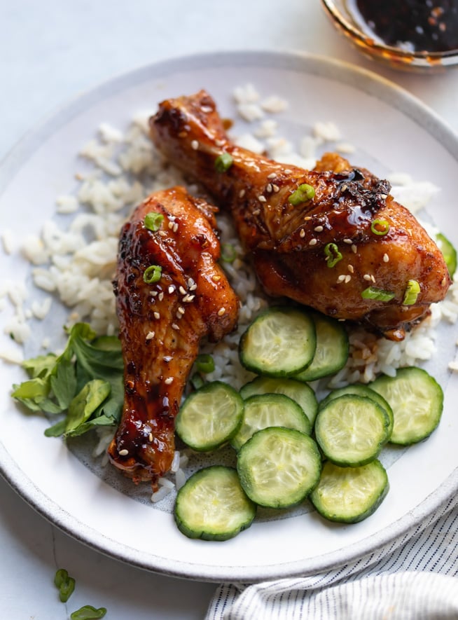 A plate of teriyaki chicken legs