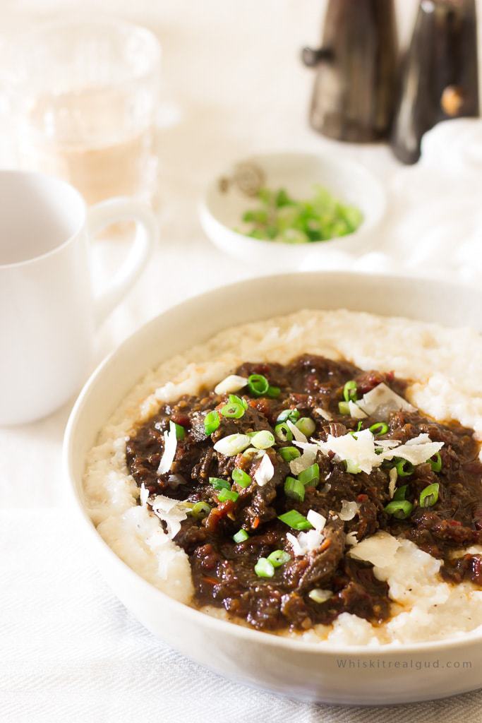Grits and grillades prounouced (/ɡree-yahds/) is a popular southern New Orleans brunch/lunch usually served over grits. The meat, usually beef, (pork or veal is also used) is slow cooked in a rich and flavorful beef gravy made up of diced tomatoes, onions, red wine, beef broth, peppers, celery etc and served over cheesy Parmesan grits. Grits and grillades is perfect for Christmas brunch! So delicious!