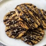 Benne or sesame seeds  were brought to America by West African slaves. They were commonly used to enhance the flavors of foods or used as a thickening agent.  African slaves believed the seeds to be good luck. Benne wafers are a staple dessert for many people in South Carolina and they are often served during Kwanzaa as well. Melt in your mouth, crisp, chewy, nutty and caramelized benne or sesame wafer/cookies are perfect for the holidays. For a more traditional type cookie, leave them plain or make them festive by drizzling them with chocolate sauce. Both ways are equally delicious.