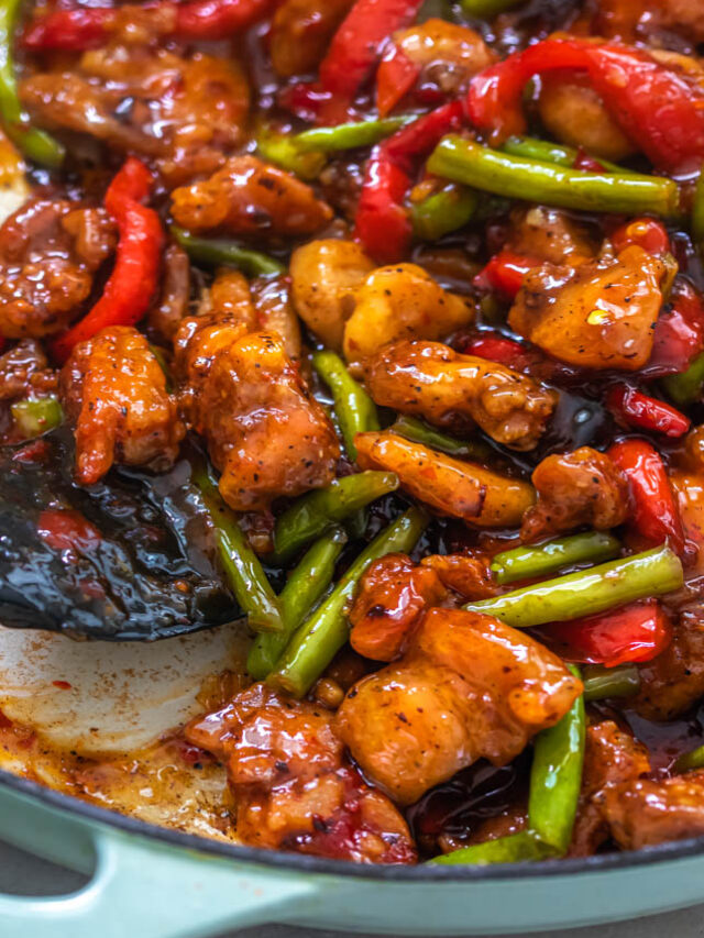 A pan of chicken green bean stir fry