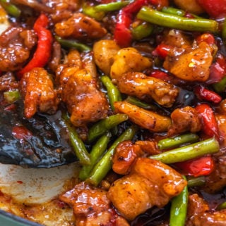 A pan of chicken green bean stir fry