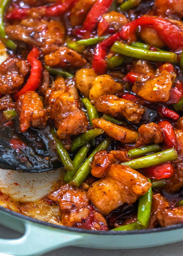 A pan of chicken green bean stir fry