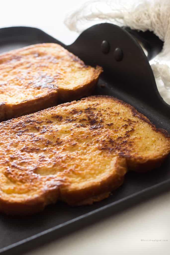 Picture of a griddle with french toast. 