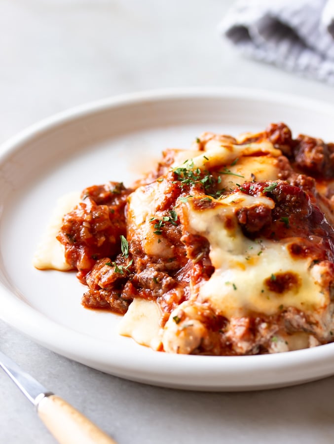 a plate of cheesy lazy lasagna with ravioli