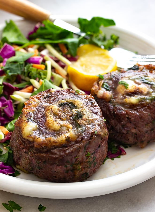 A plate of stuffed flank steak aka pinwheels
