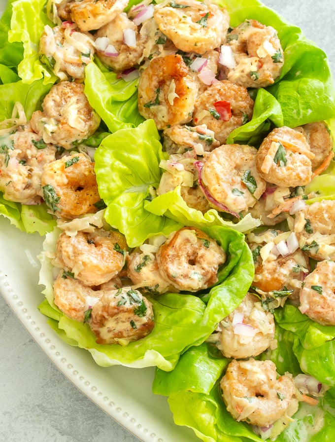 A plate of shrimp lettuce wraps with sweet chili mayo