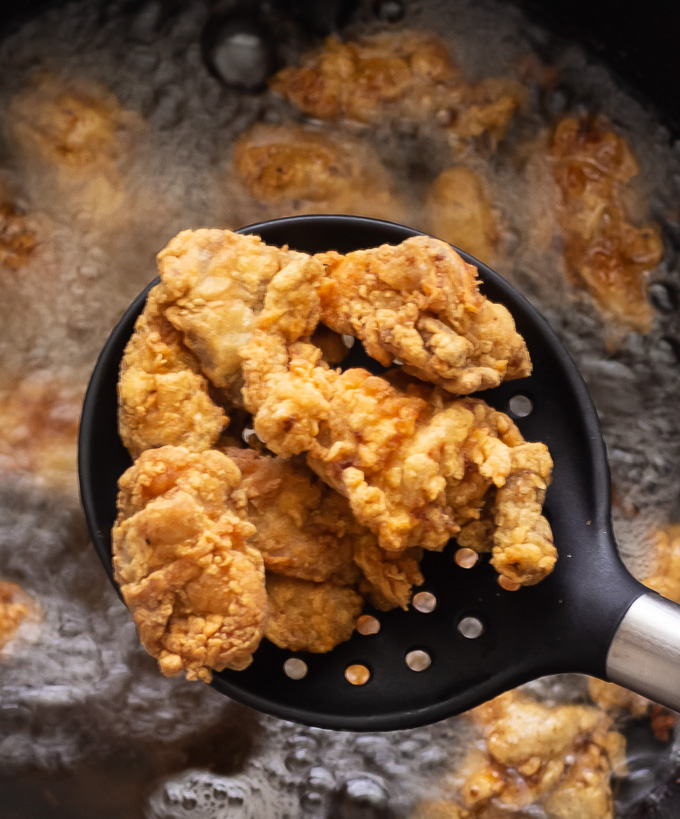 Crispy fried chicken fresh out of the oil 