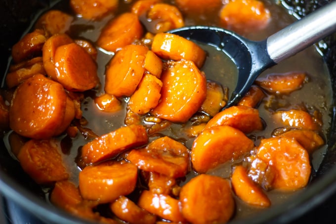 Candied yams in a pot cooked on the stovetop