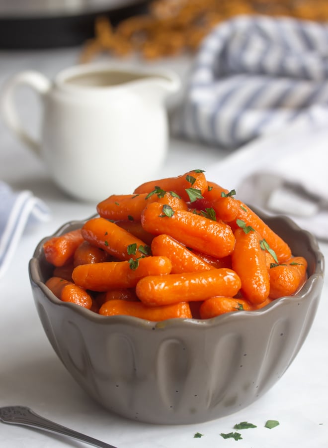 A bowl of instant pot glazed baby carrots