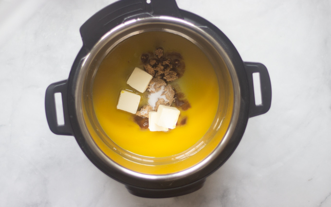 Instant pot with carrots, oj, butter and sugar