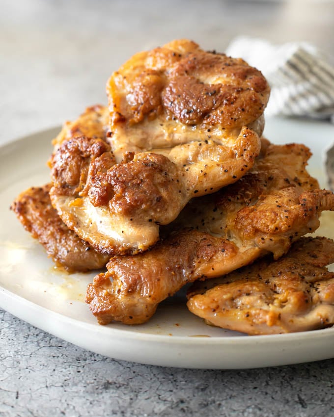 stovetop skinless chicken thighs on a plate