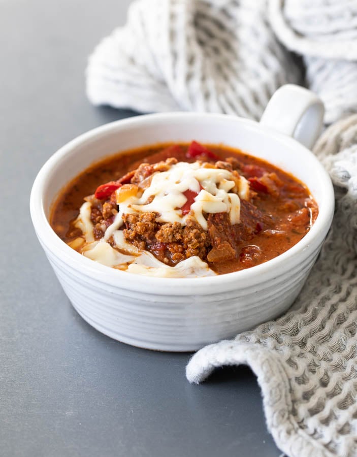 Soup with pepperoni in a bowl