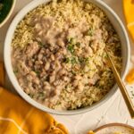 A picture of creamy black eyed peaswith smoked turkey in a bowl also known as Hoppin John