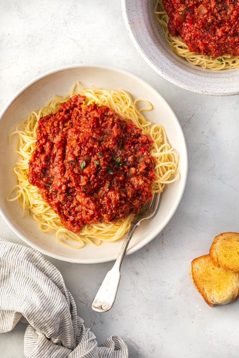 A picture of meat sauce with ground beef and spaghetti