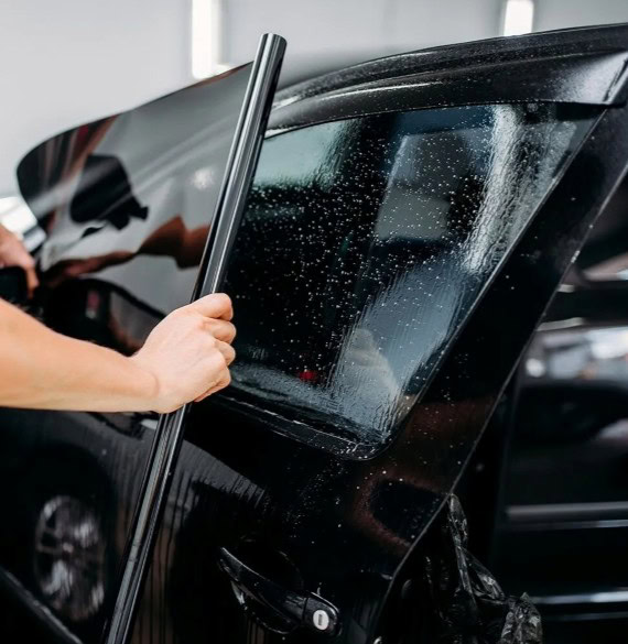 Professional car window tinting service at Winston Wheels & Tires.