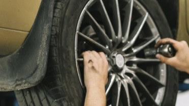 Professional installation of custom alloy wheels and tires at Winston Wheels & Tires.