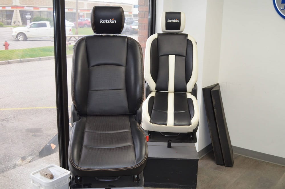 Modern ergonomic office chairs with black and white upholstery at Wright ReStyling.