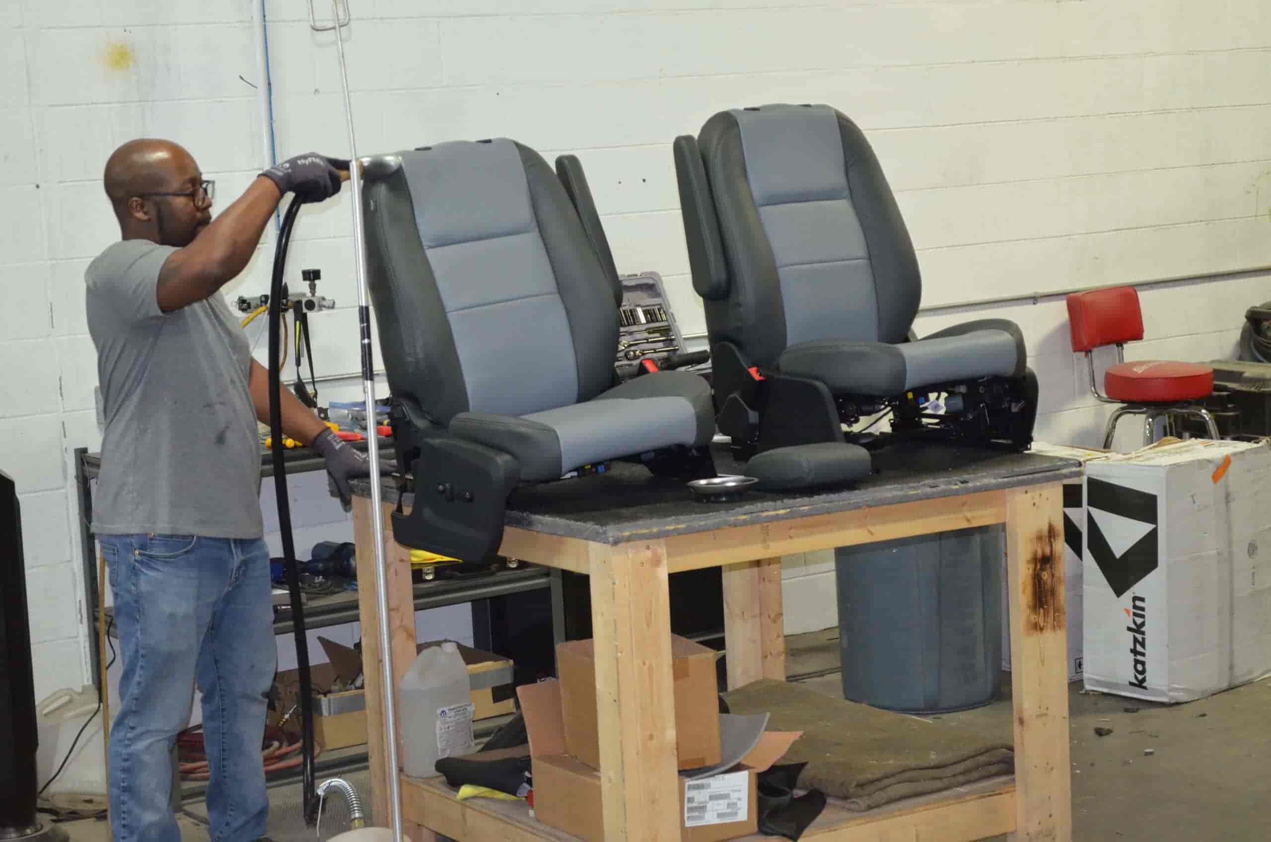 Car seat reupholstery and repair by Wright ReStyling. Expert craftsmanship in restoring vehicle seat.