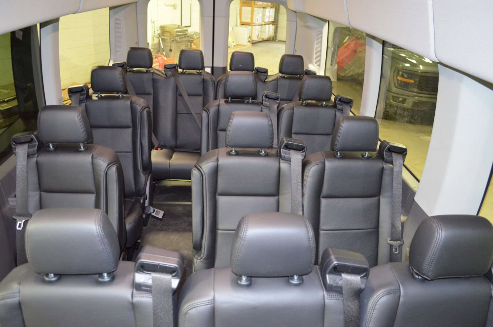 Van interior with upgraded leather seats and modern design.