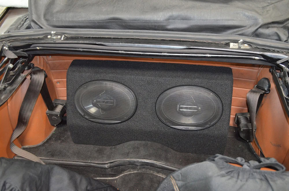 Custom car subwoofer installation with Wright ReStyling expertise.