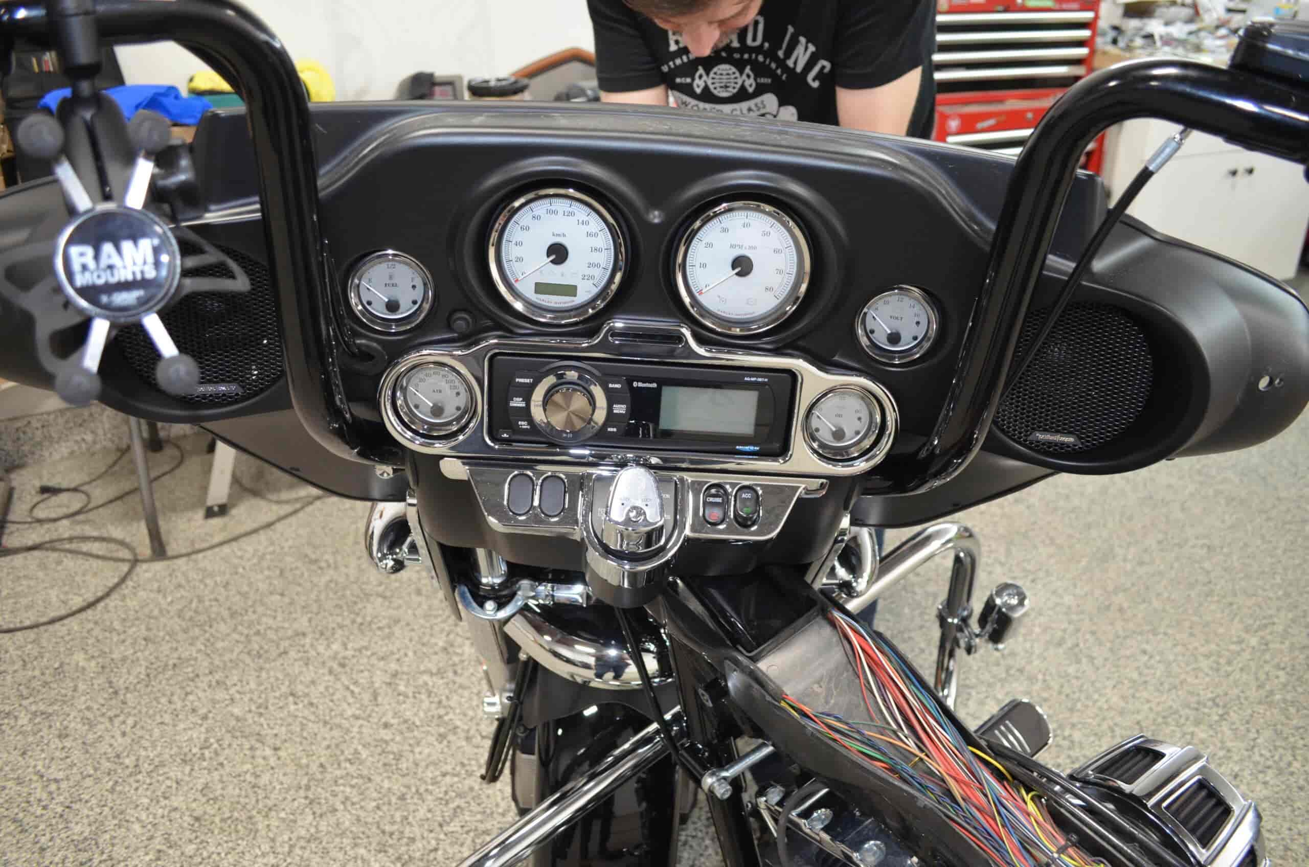 Custom motorcycle dashboard with gauges and wiring, restored by Wright ReStyling.