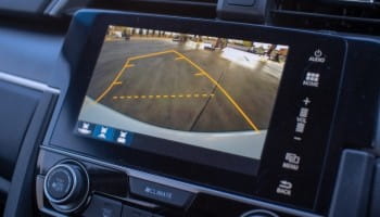 Backup camera with parking assist for safe vehicle maneuvering.
