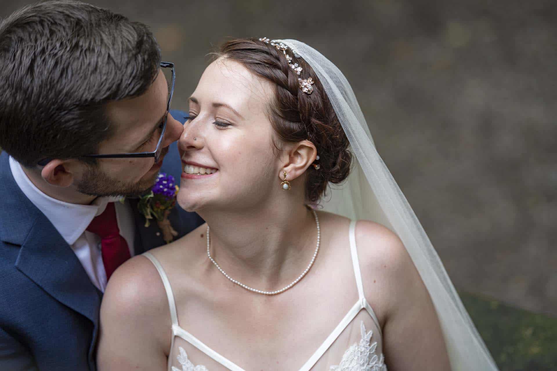 London wedding photographer posing the bride and groom
