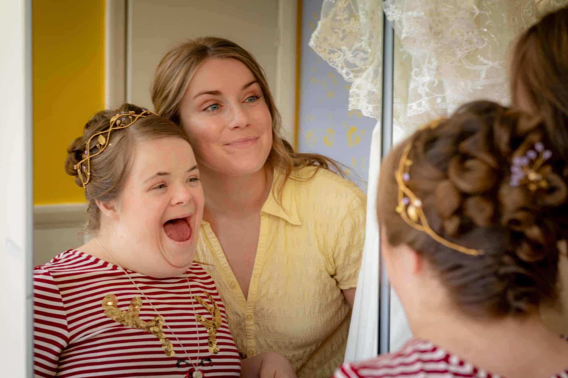 Downs syndrome sisters helper heidi suzie make-up tiara