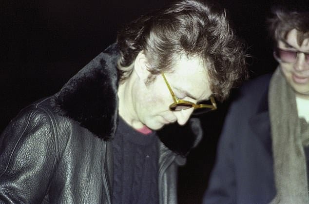 John Lennon signs autograph for Mark Chapman