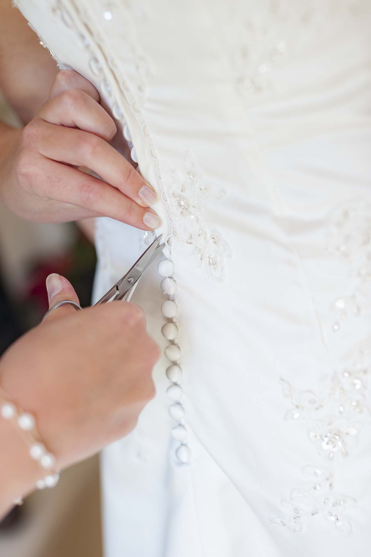 50mm nifty fifty lens wedding photographer 141211 Ashtead surrey wedding Bride preparations wedding dress