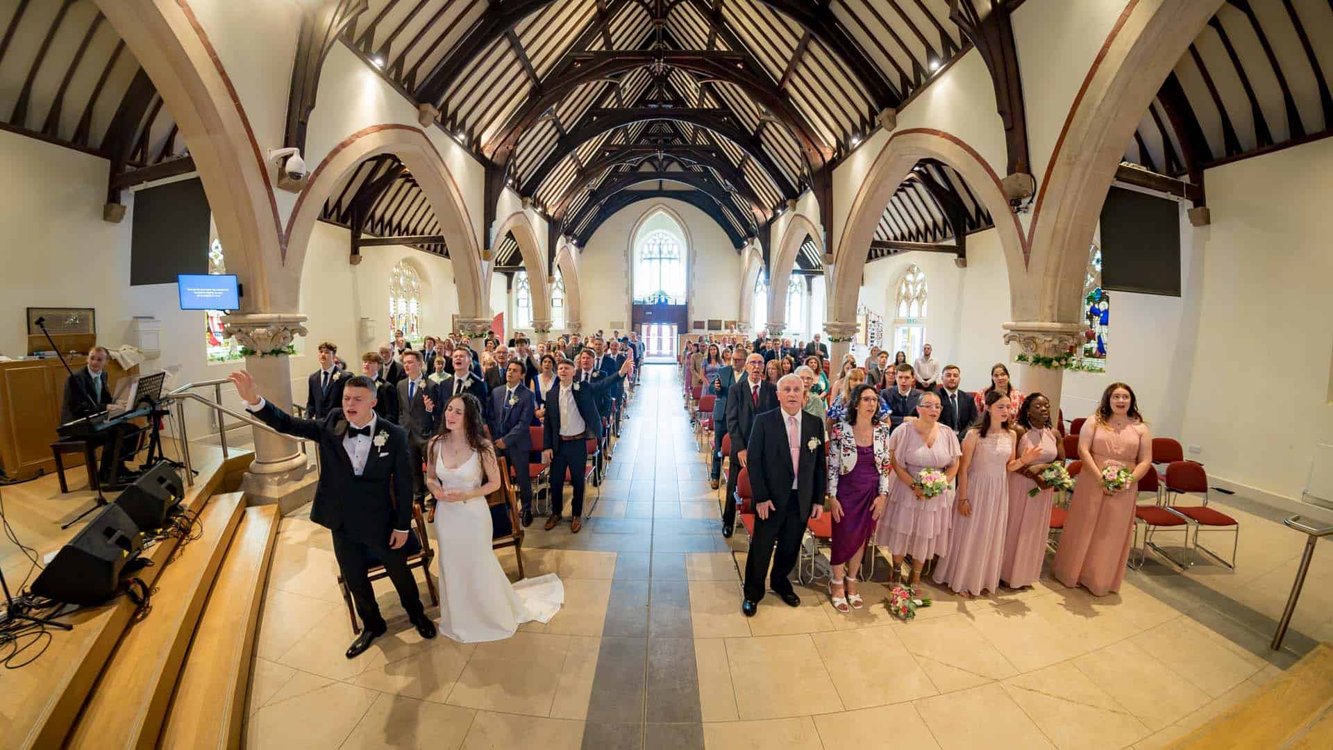 Singing during wedding Holy Trinity Church Wallington Surrey wedding Bromley kent wedding photographer
