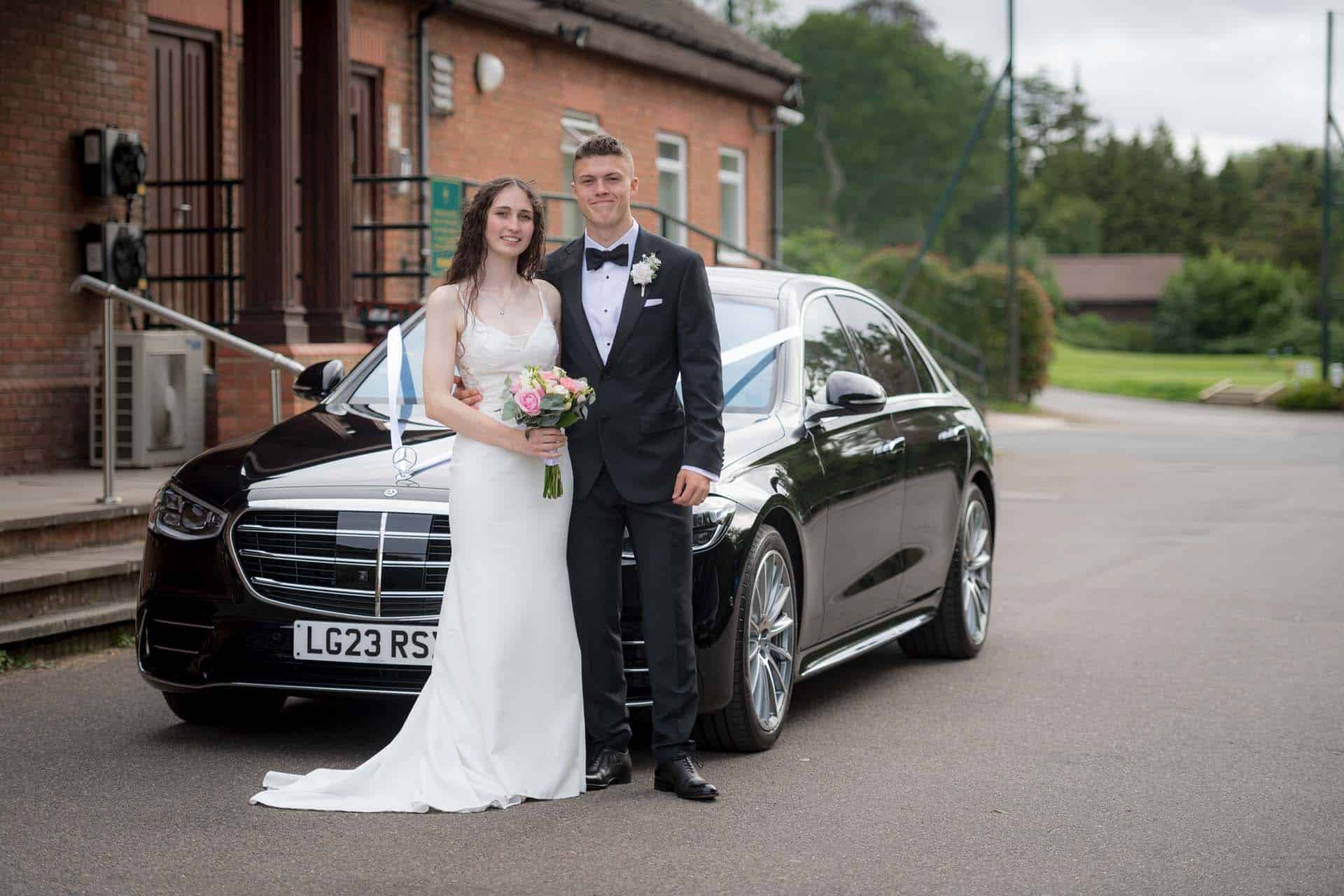Bride and Groom with car chipstead golf club reception Bromley kent wedding photographer
