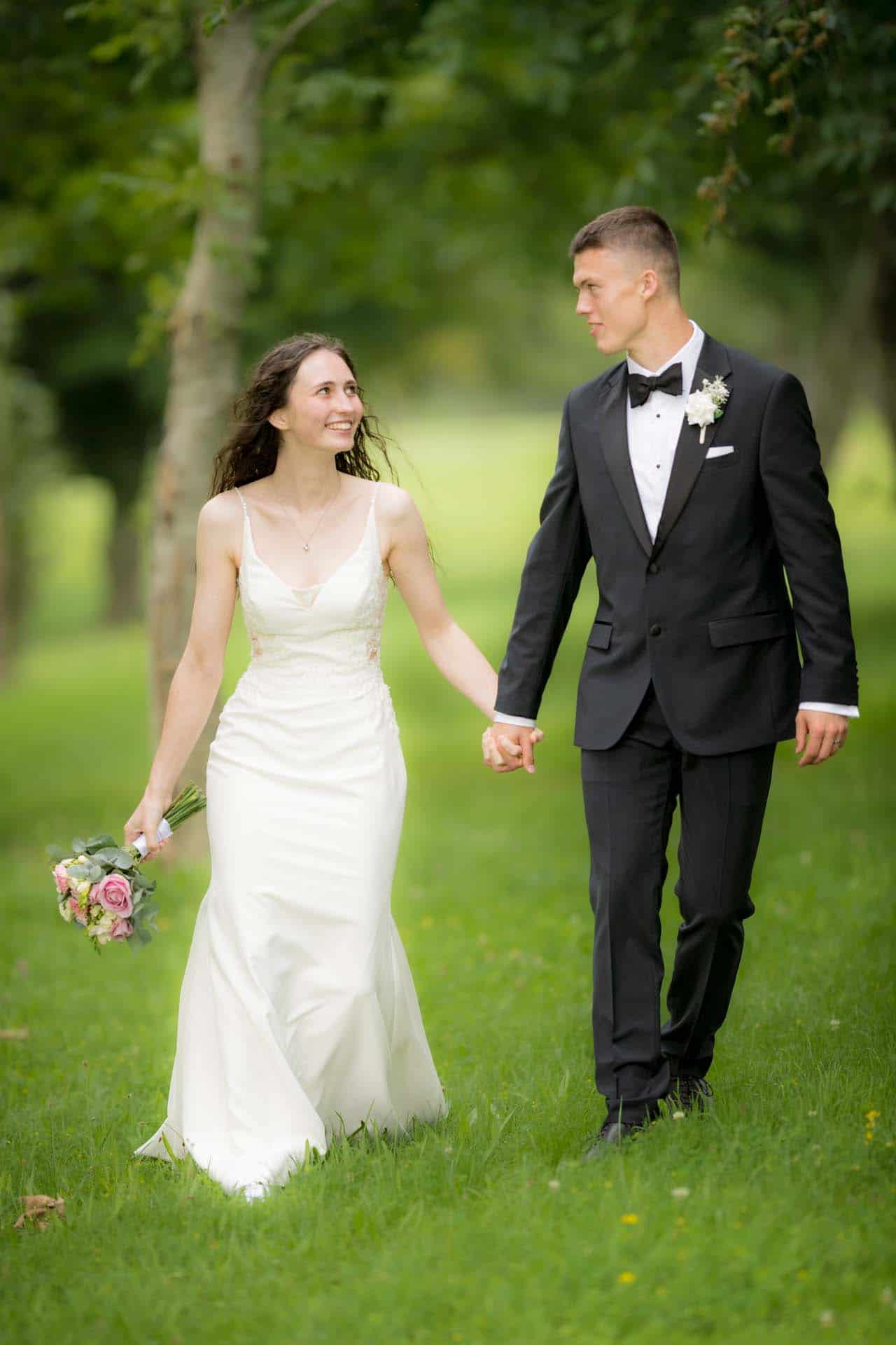 Bride and Groom full length walking portrait Wallington Surrey wedding chipstead golf club reception Bromley kent wedding photographer