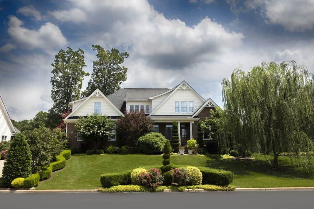 A house on the article Top 5 Low Growing Shrubs for Front of House