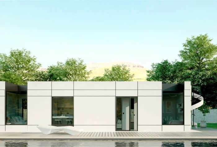 Casa moderna prefabricada con jardín.