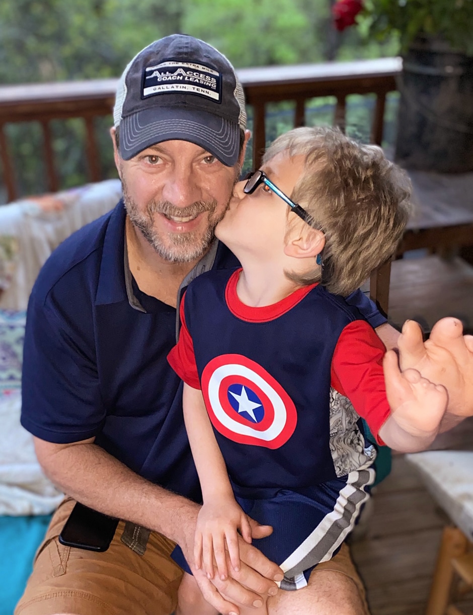 Barry and Tyler portrait showing their similar hands