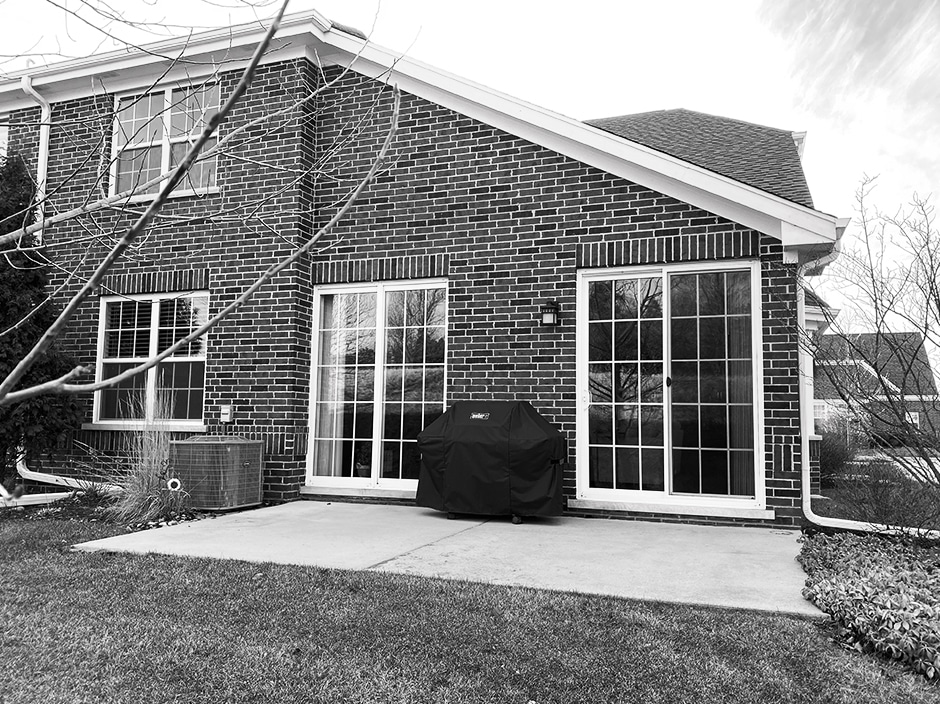 patio before remodel in black and white