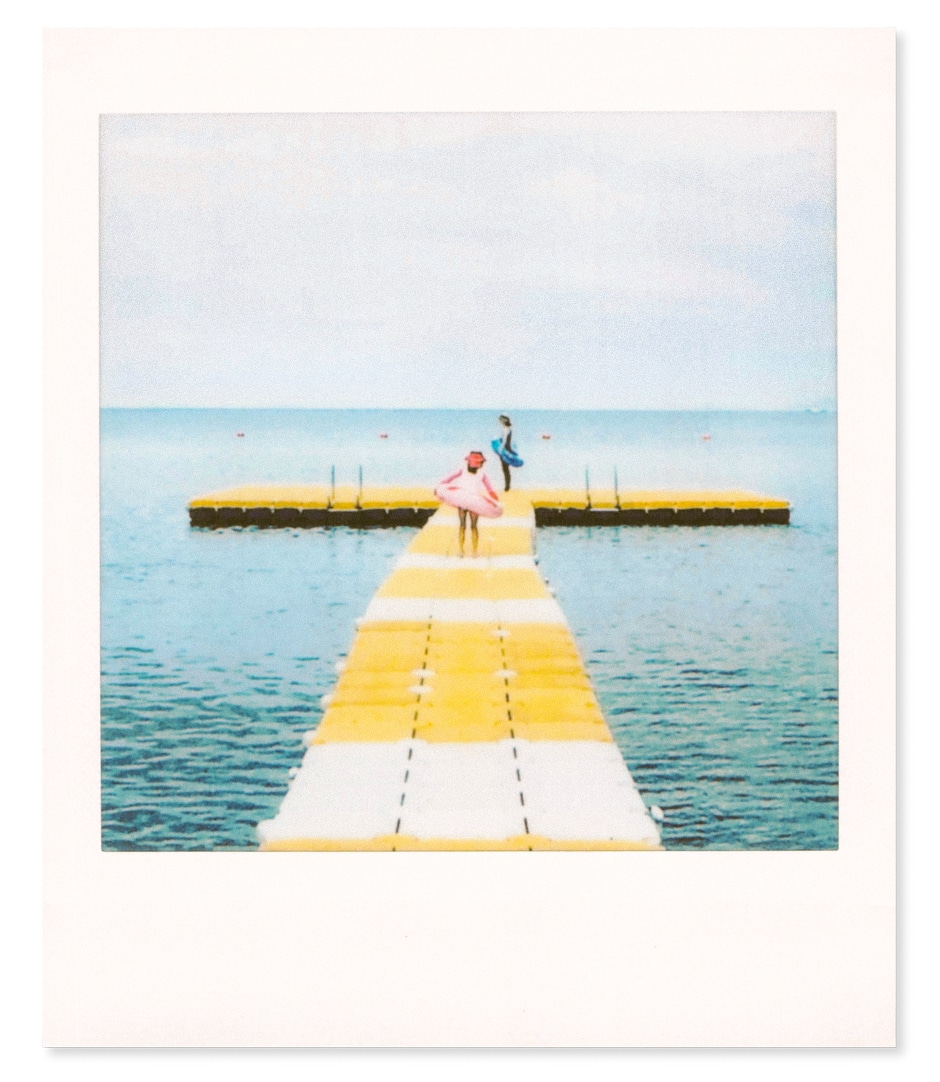 picture of kids playing on boat dock