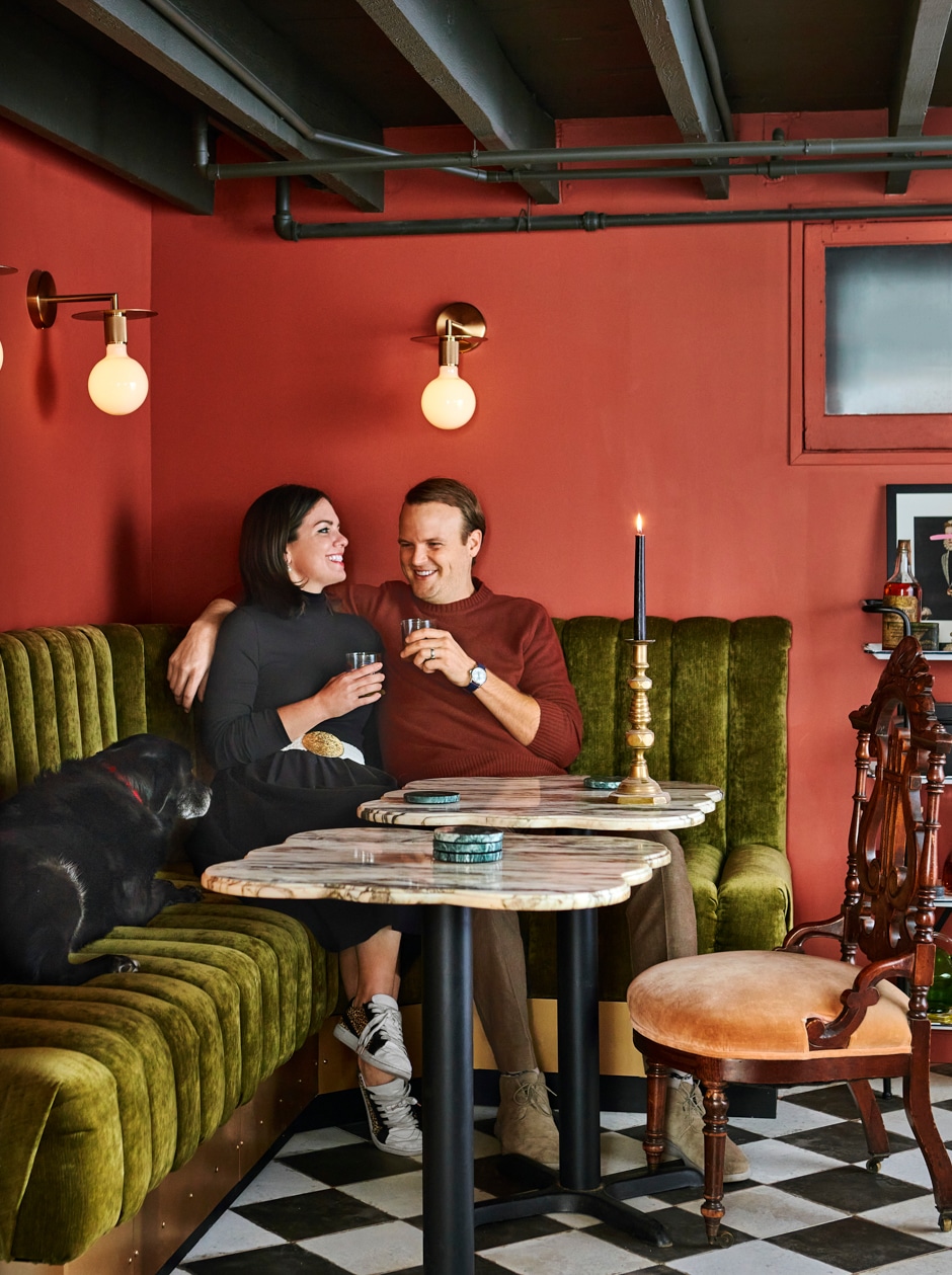 couple sitting in moody breakfast nook