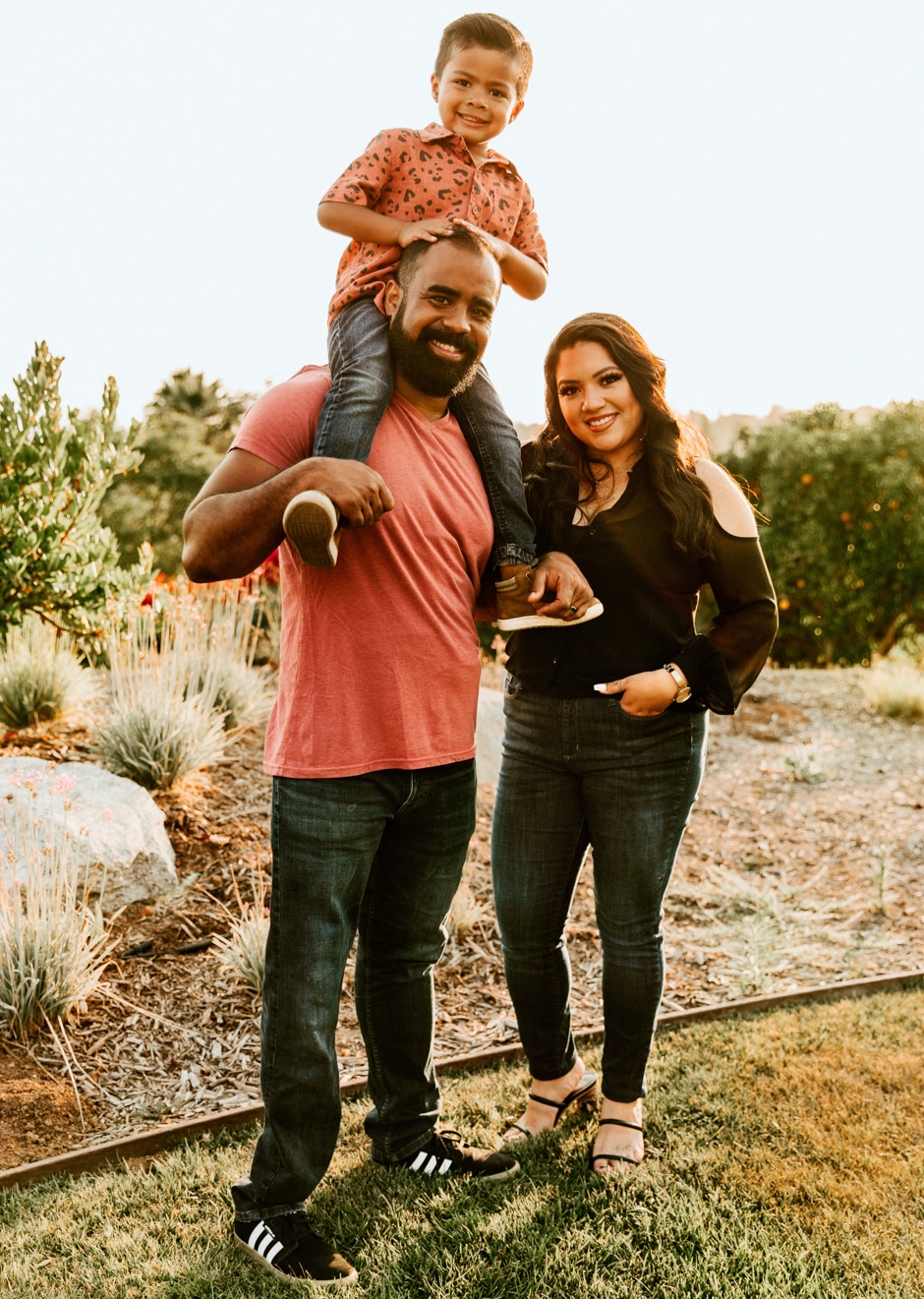 Darryl family portrait in sunny yard