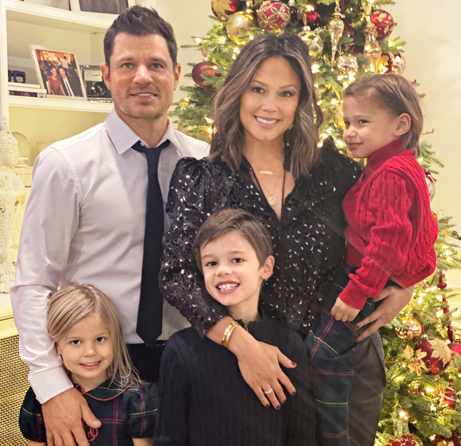 family portrait in front of christmas tree