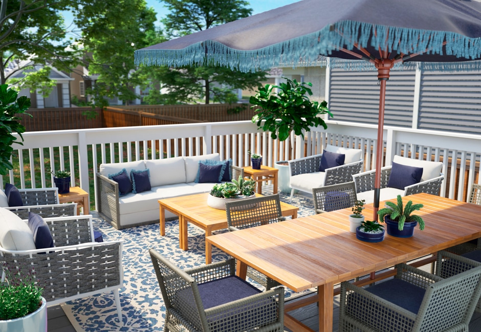 blue and white deck renovation with large umbrella