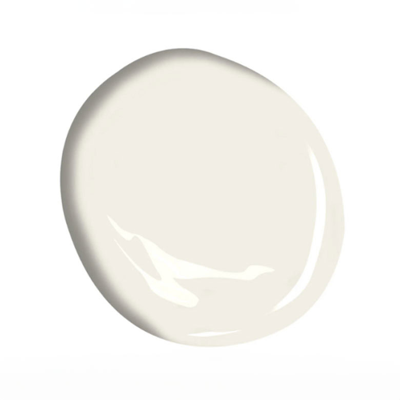 An irregular, rounded blob of creamy white paint with subtle shadowing, giving it a three-dimensional appearance