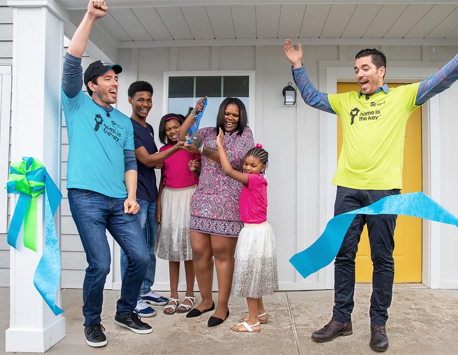osbornes and brothers celebrating home completion