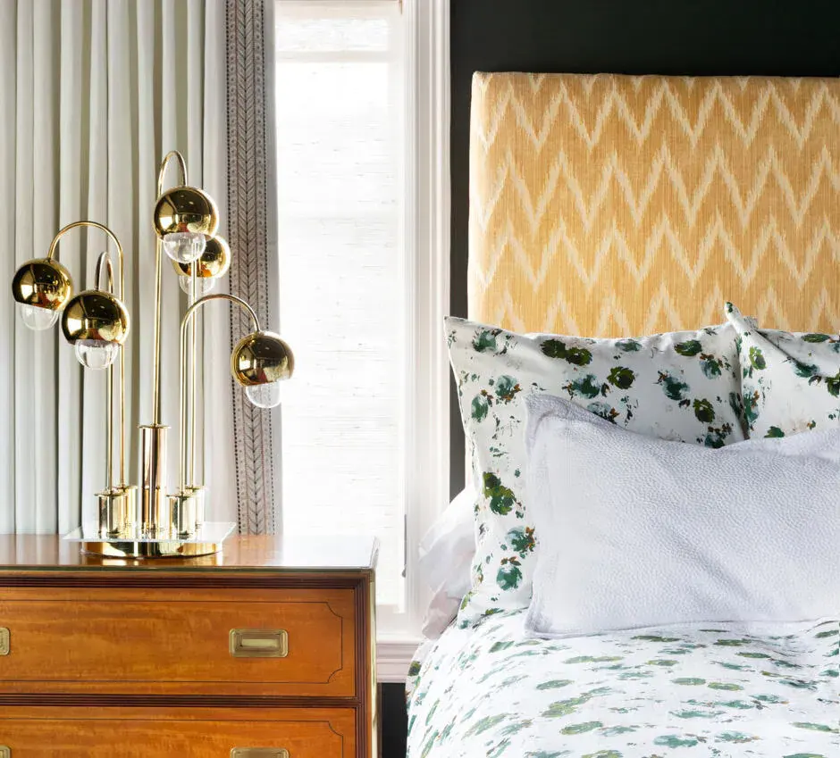 sunlit bedroom with chevron yellow statement art