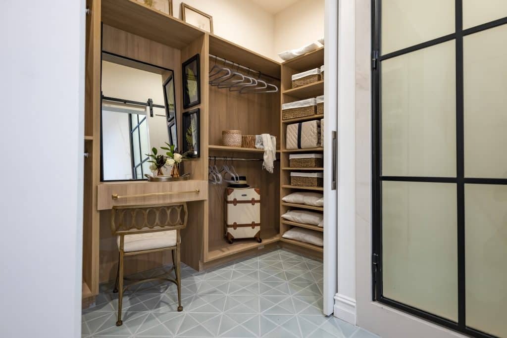 well-organized-walk-in-closet-with-vanity-area